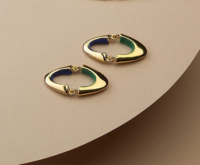 Elegant gold and green hoop earrings for women, perfect for stylish accessories.