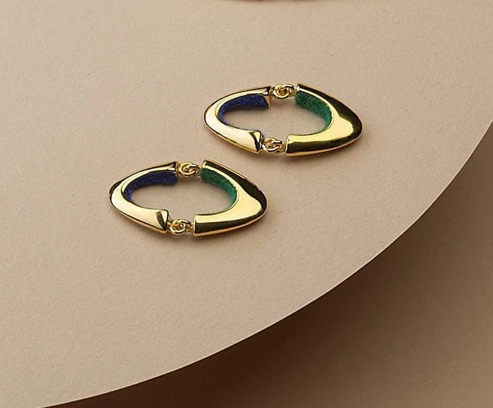 Elegant gold and green hoop earrings for women, perfect for stylish accessories.