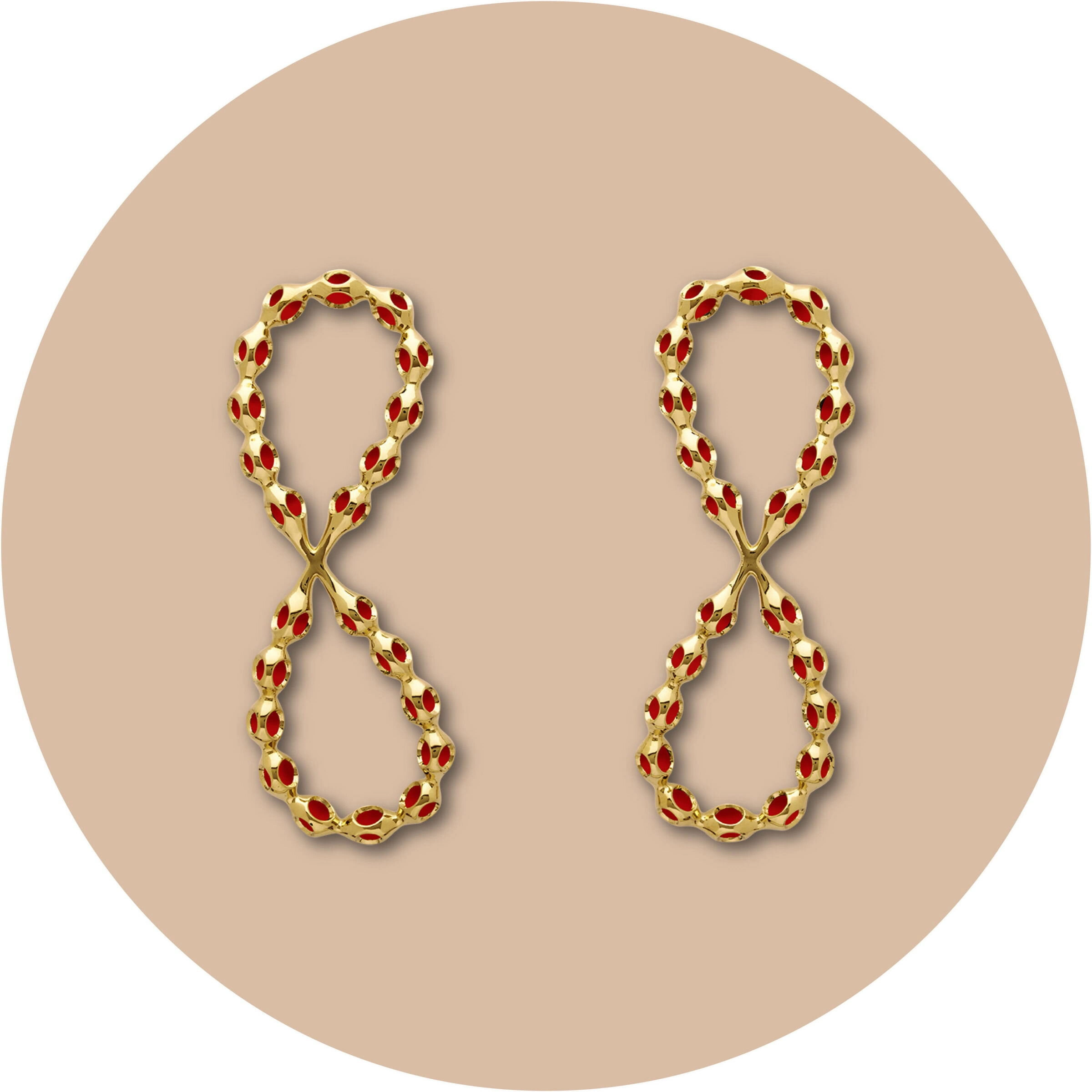 Elegant gold earrings with red accents, perfect for Valentine's Day or special occasions.