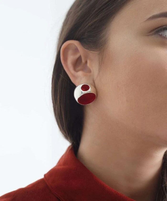 Red and silver geometric earrings for statement style.