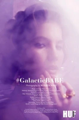 Elegant portrait of Monica Varela with dreamy purple hues, emphasizing beauty and sophistication.