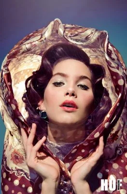 Glamorous Monica Varela fashion photo, close-up with vintage styling and bold makeup.