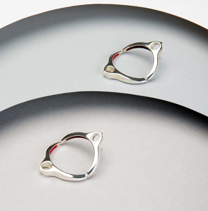 Sterling silver earrings with modern, minimalist design for elegant style. Perfect for everyday wear.