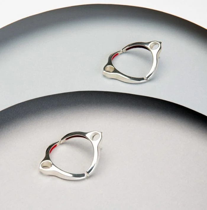 Sterling silver earrings with modern, minimalist design for elegant style. Perfect for everyday wear.
