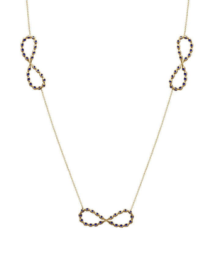 Elegant infinity necklace featuring blue gemstone-encrusted loops, perfect for stylish accessories.