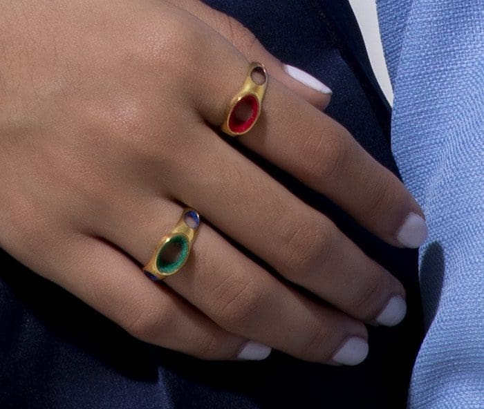 Elegant gold Kora rings with colorful gemstones, perfect for stylish accessories.