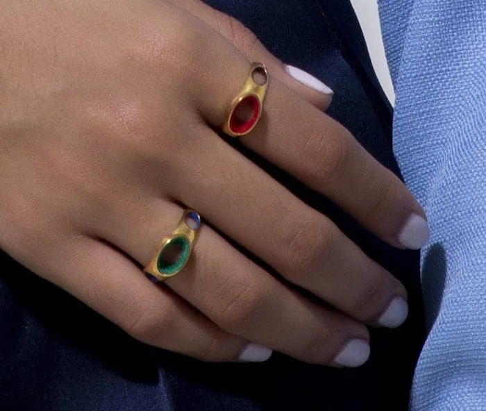 Elegant gold Kora rings with colorful gemstones, perfect for stylish accessories.