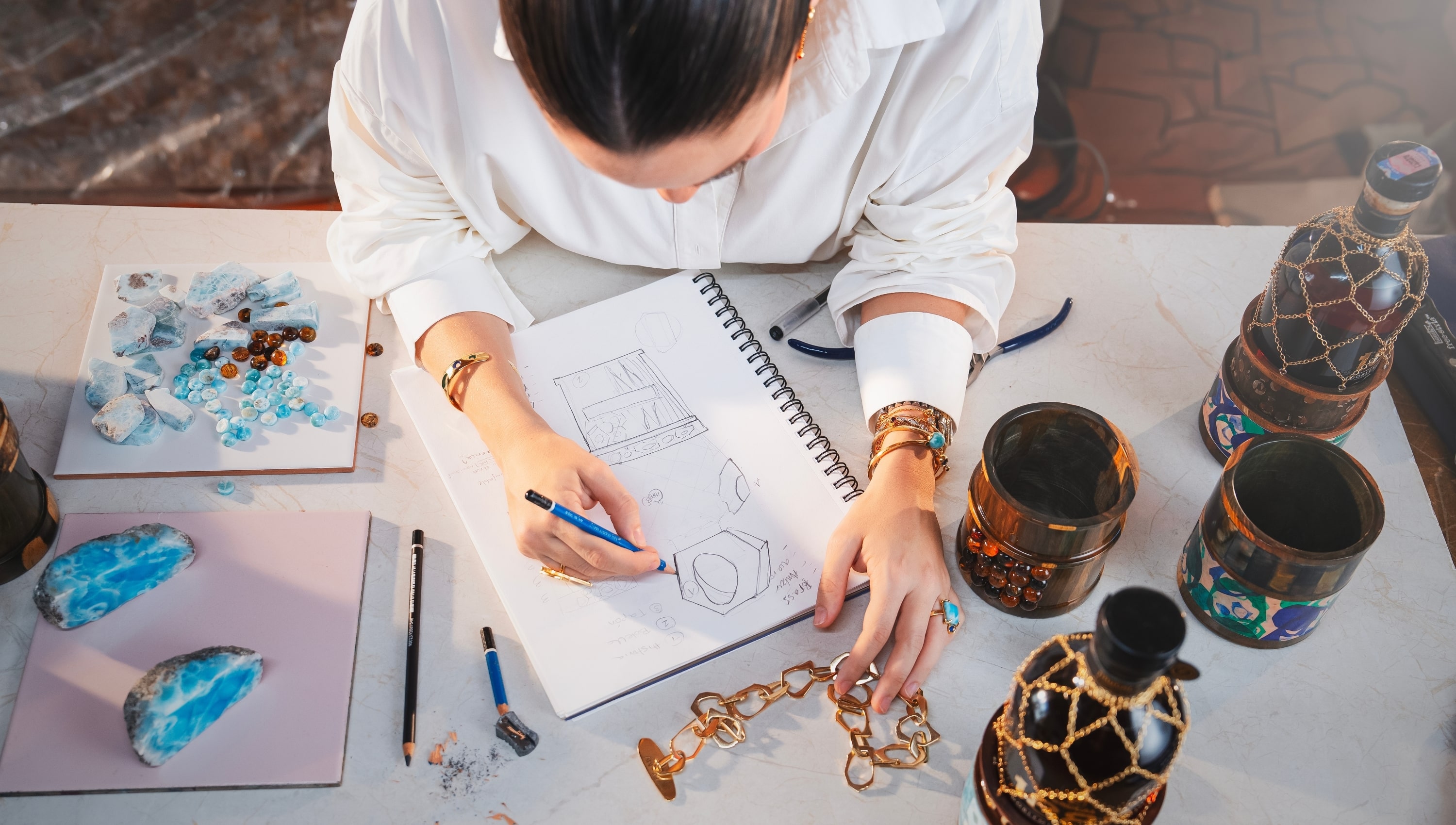 Mónica Varela sketching designs for the Brugal 1888 collaboration