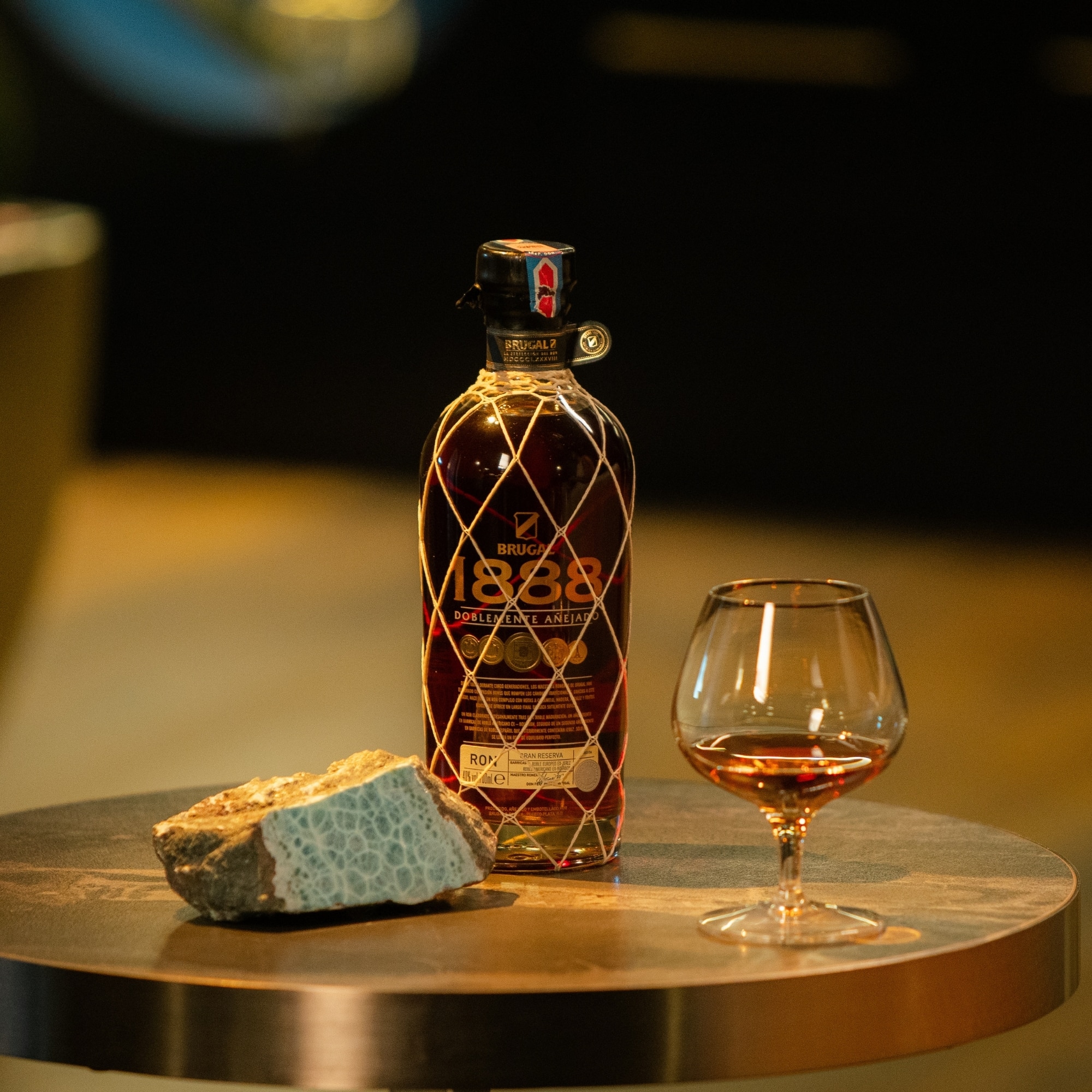 Brugal 1888 hand-intervened bottle with Larimar