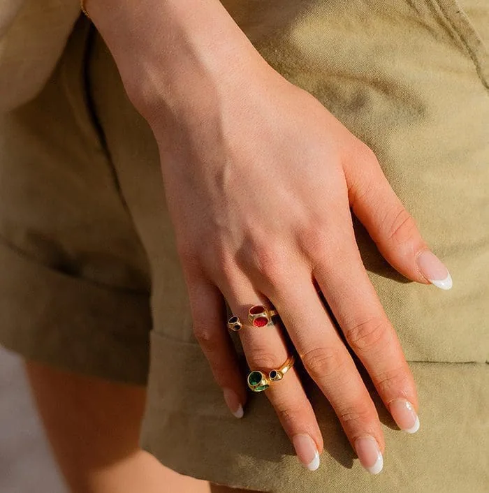 Stunning gold-tone rings with colorful gemstones, perfect for stylish and elegant accessories.