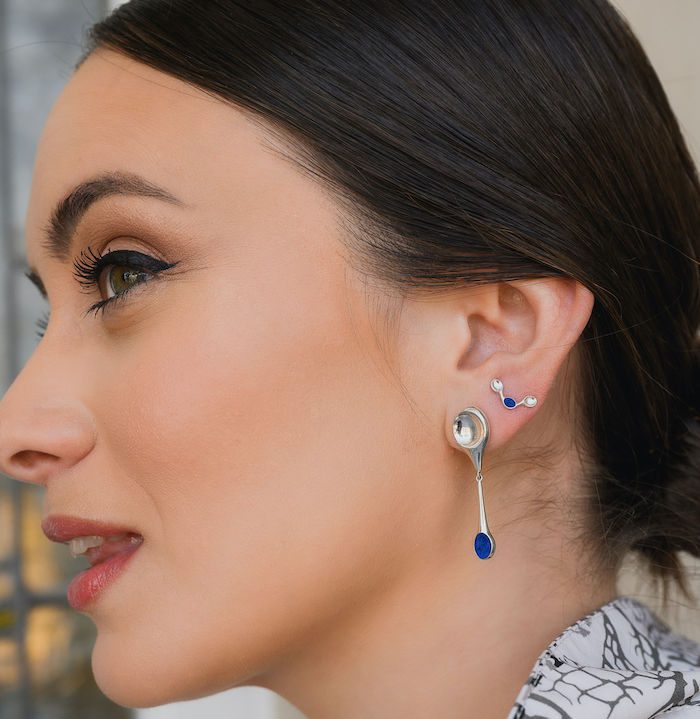 Delicate stem earrings featuring blue and silver accents, perfect for stylish accessories and jewelry lovers.
