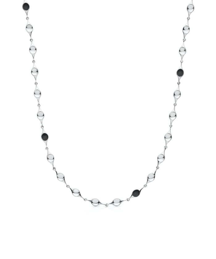 Elegant sterling silver stem necklace with sleek design and black accents for a modern look.