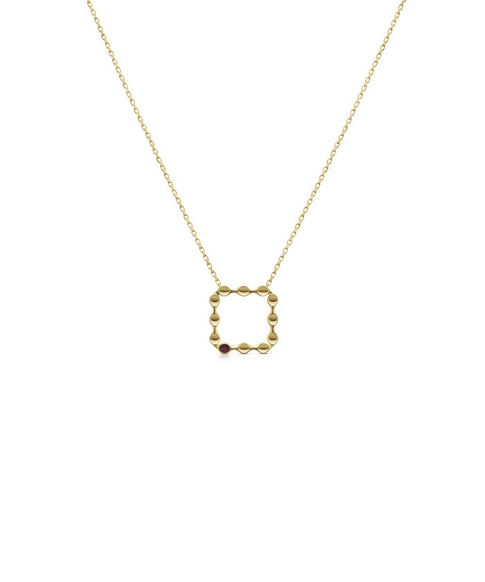 Elegant gold mini square pendant with a small red gemstone detail. Perfect for layered jewelry style.