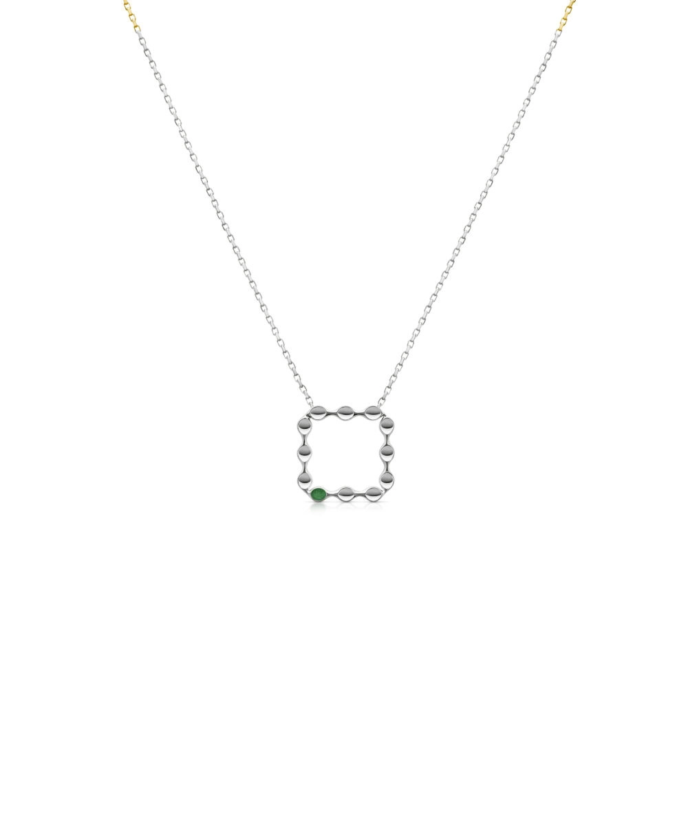 Elegant silver necklace featuring a sleek square pendant with a green gemstone accent, perfect for minimalist jewelry lovers.