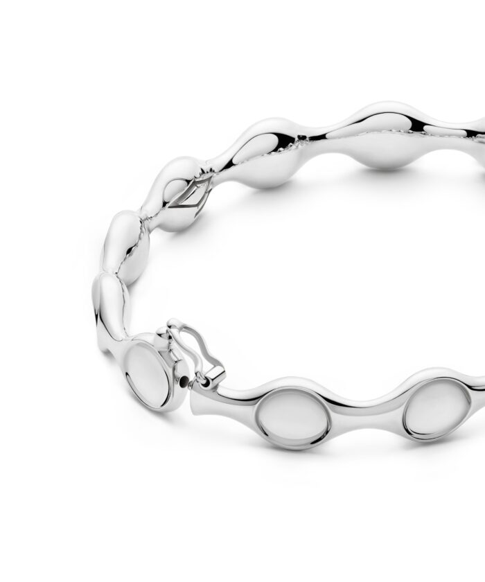 Stunning modern silver bangle with a sleek, chic design, perfect for stylish accessories.