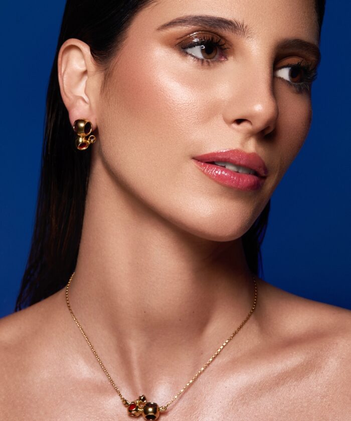 Exquisite Monica Varela jewelry with pendant and earrings, ideal for luxury accessories and statement looks.