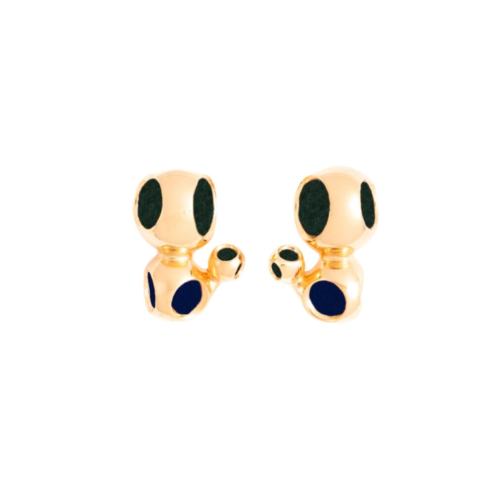 Playful dog jewelry with black accents, perfect for stylish accessories.