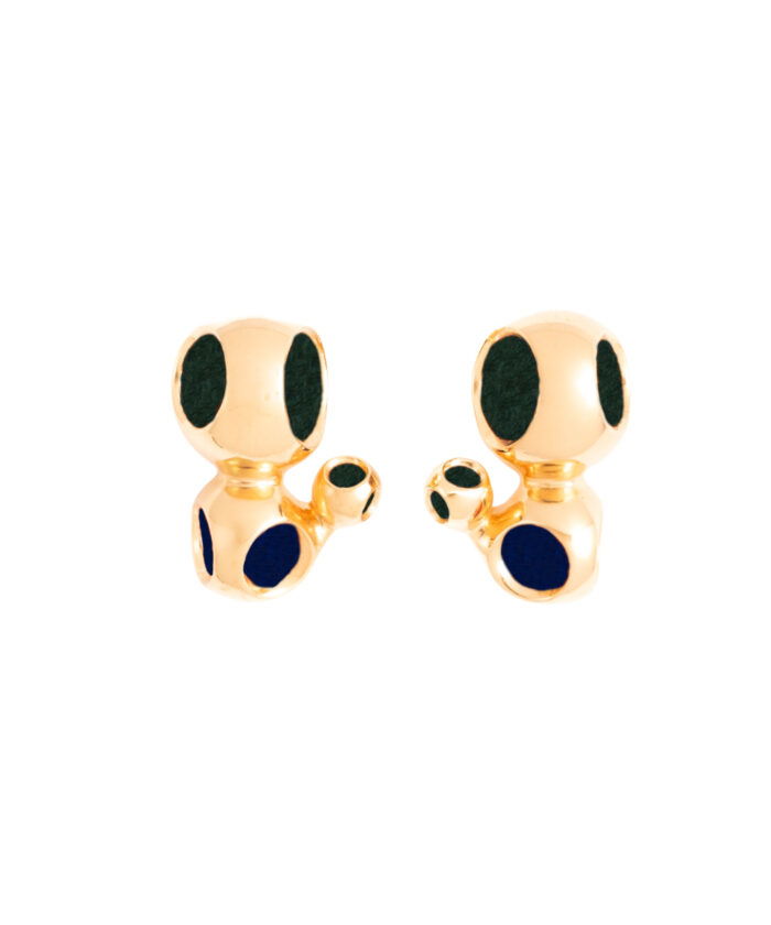 Playful dog jewelry with black accents, perfect for stylish accessories.