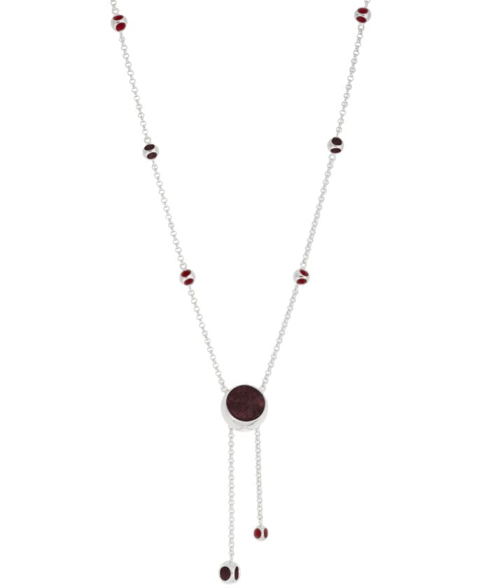 Stylish long necklace featuring red beads and a centerpiece, perfect for sophisticated accessories.