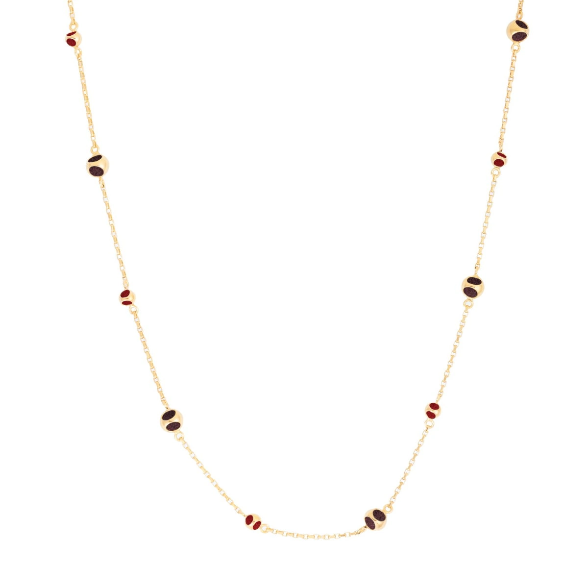 Chic Gold Necklace with Red & Black Beads Elegant gold chain with red and black bead accents for a stylish look.