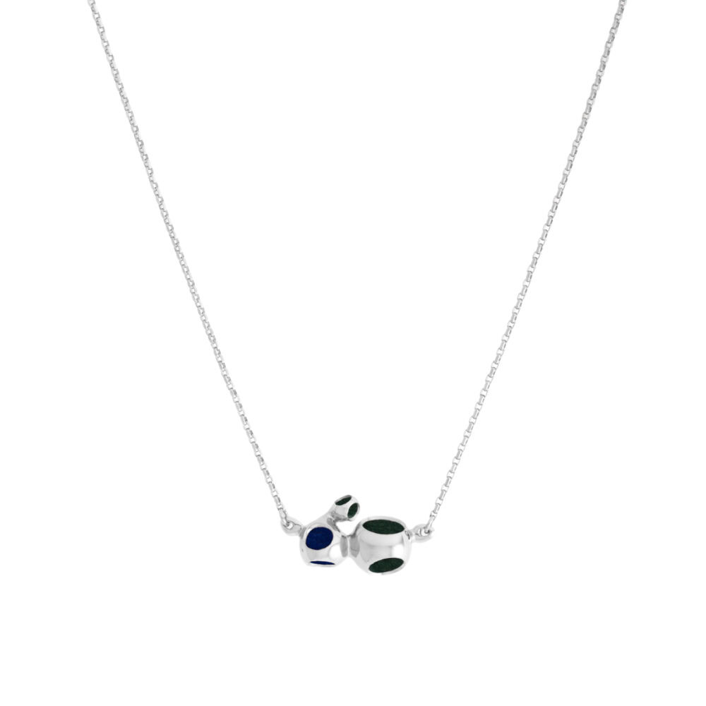 Jewelry necklace with black and navy polka dot accents, designed for style and sophistication.