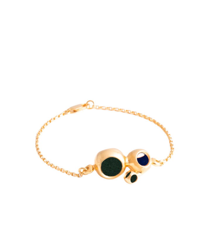 Elegant gold bracelet featuring multicolored stones and a delicate chain design.