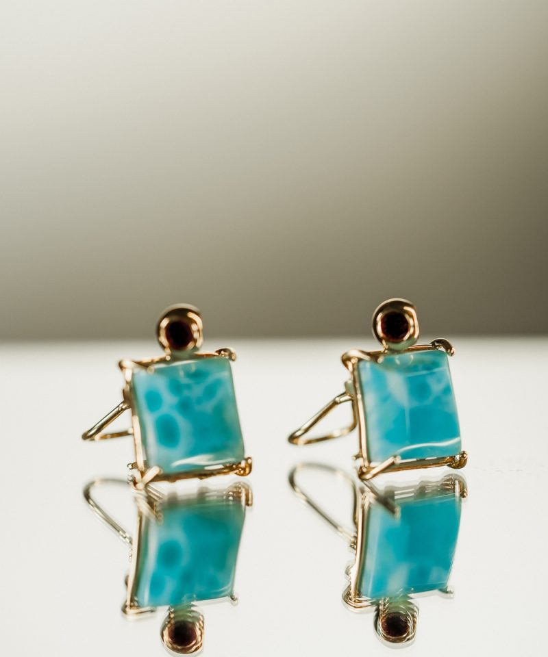 Duet Larimar Studs in 925 sterling silver with 18k gold plating and Blazing Burgundy accents, on model