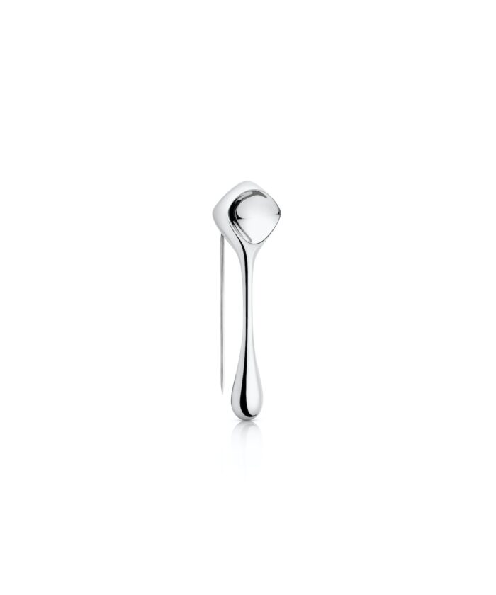 Sleek silver spoon with modern design, minimalist style.