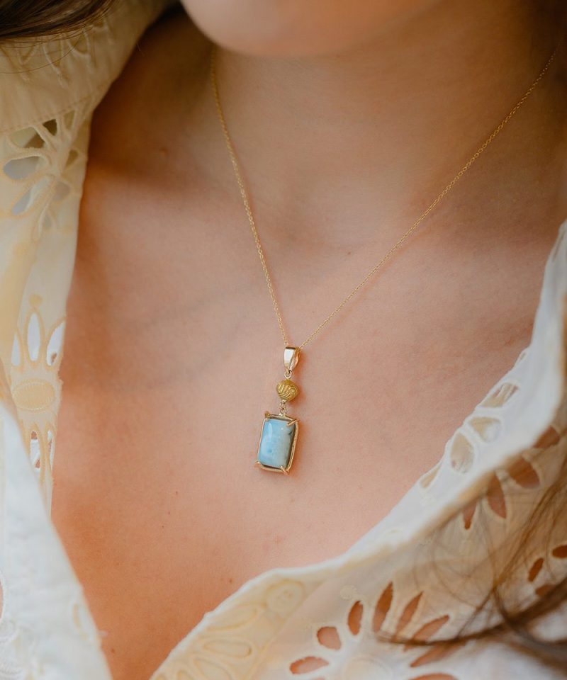 Hislú Larimar Charm in 18k yellow gold, worn by model