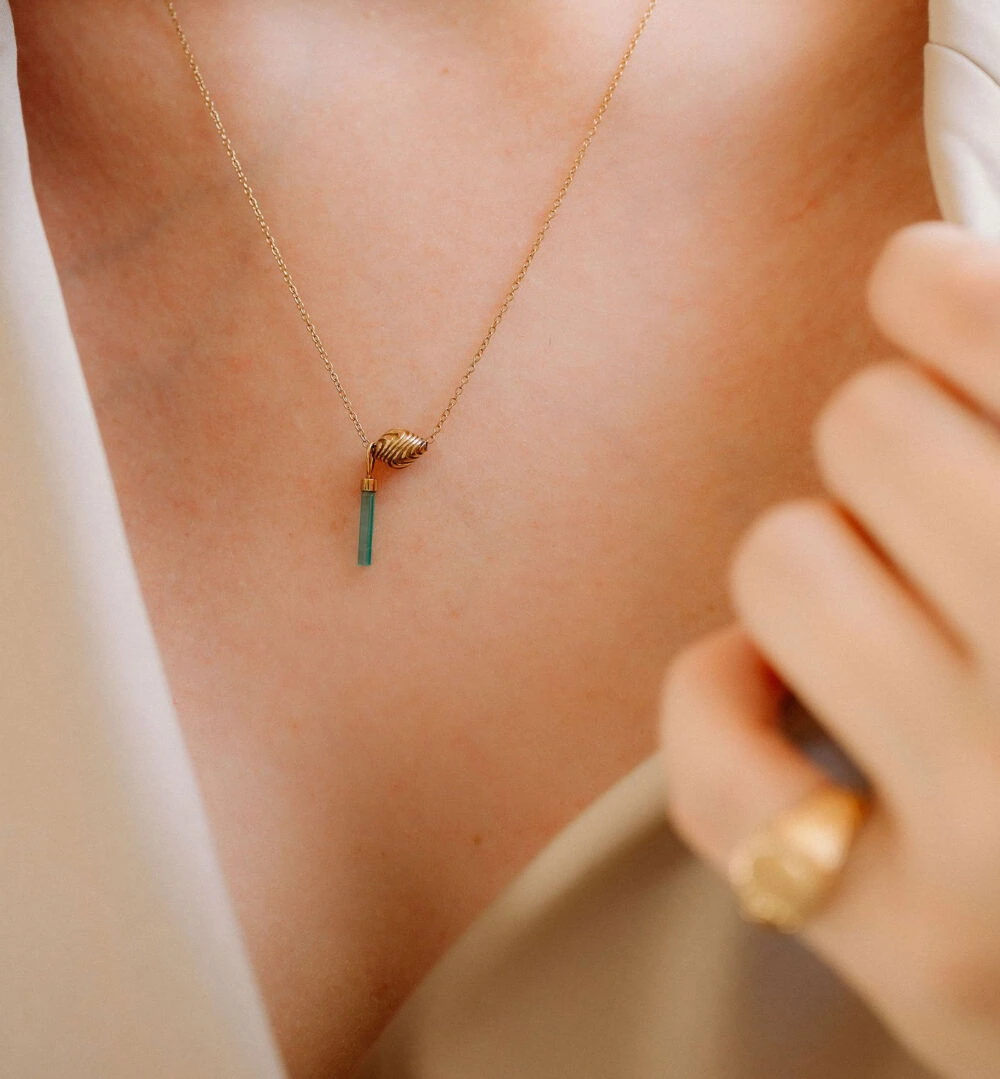 Elegant gold chain with Hislú Courage pendant, perfect for empowering and stylish accessories.