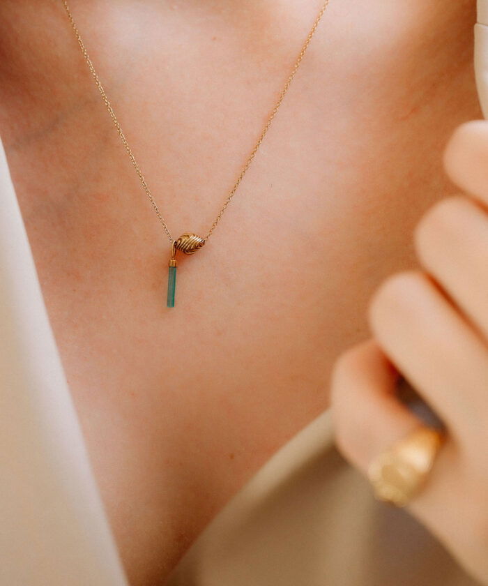 Elegant gold chain with Hislú Courage pendant, perfect for empowering and stylish accessories.