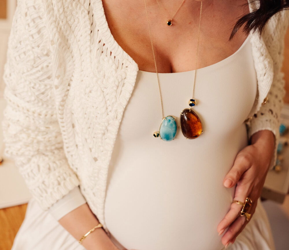 Petite larimar and amber gemstone necklace with gold chain, perfect for stylish jewelry lovers.