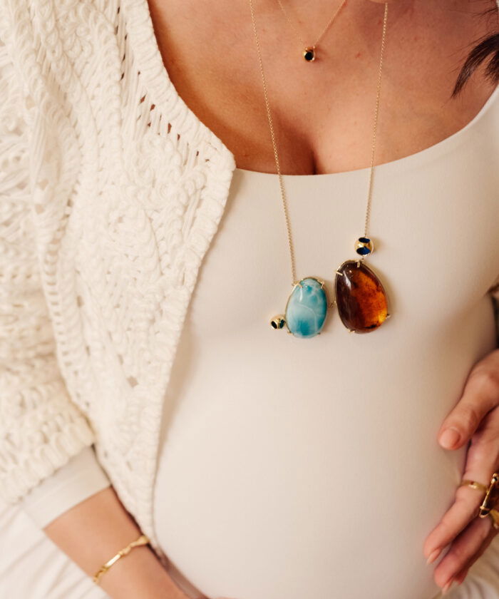 Petite larimar and amber gemstone necklace with gold chain, perfect for stylish jewelry lovers.