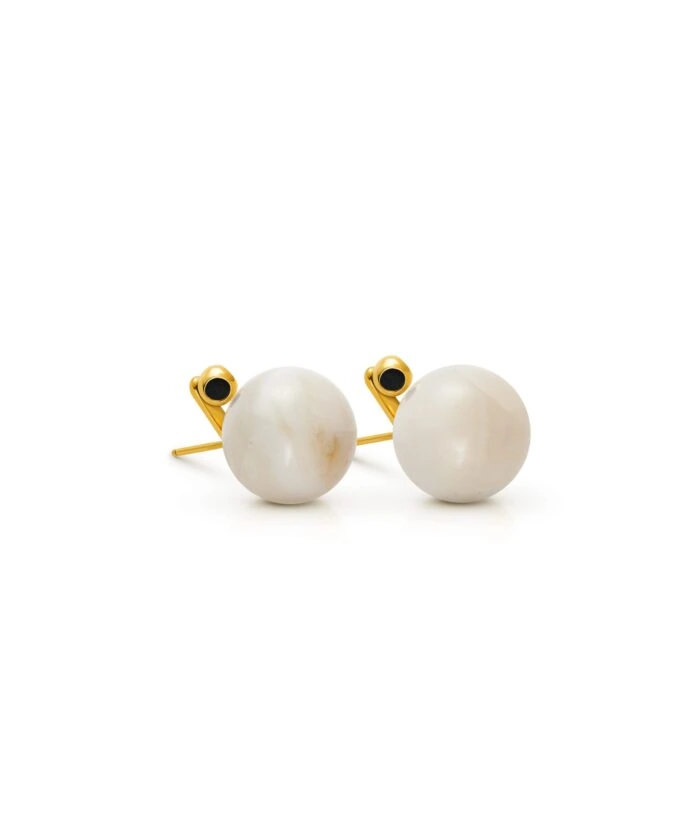 Elegant pearl stud earrings with gold settings, perfect for sophisticated jewelry looks.