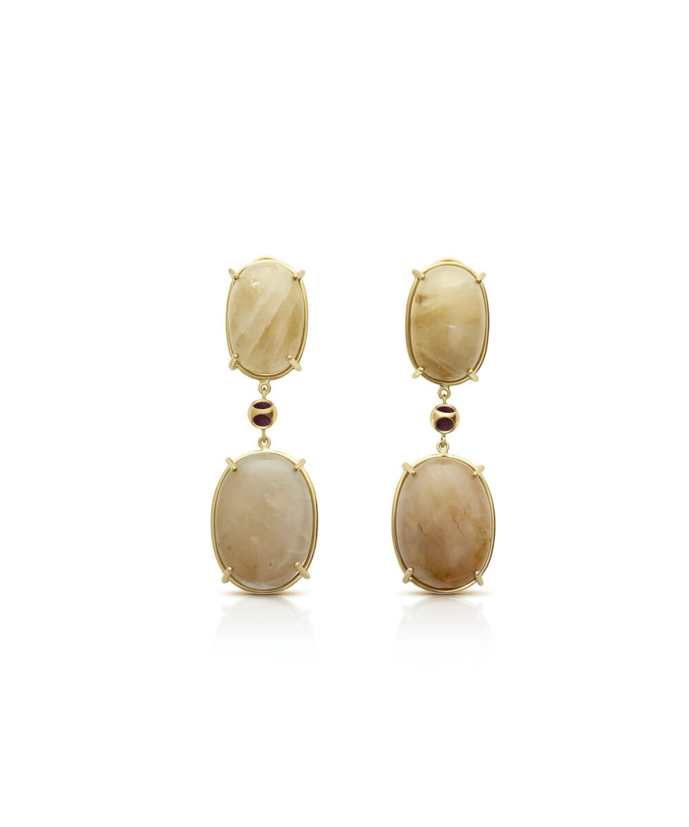 Elegant moonstone earrings with gold setting, perfect jewelry for special occasions or everyday chic.