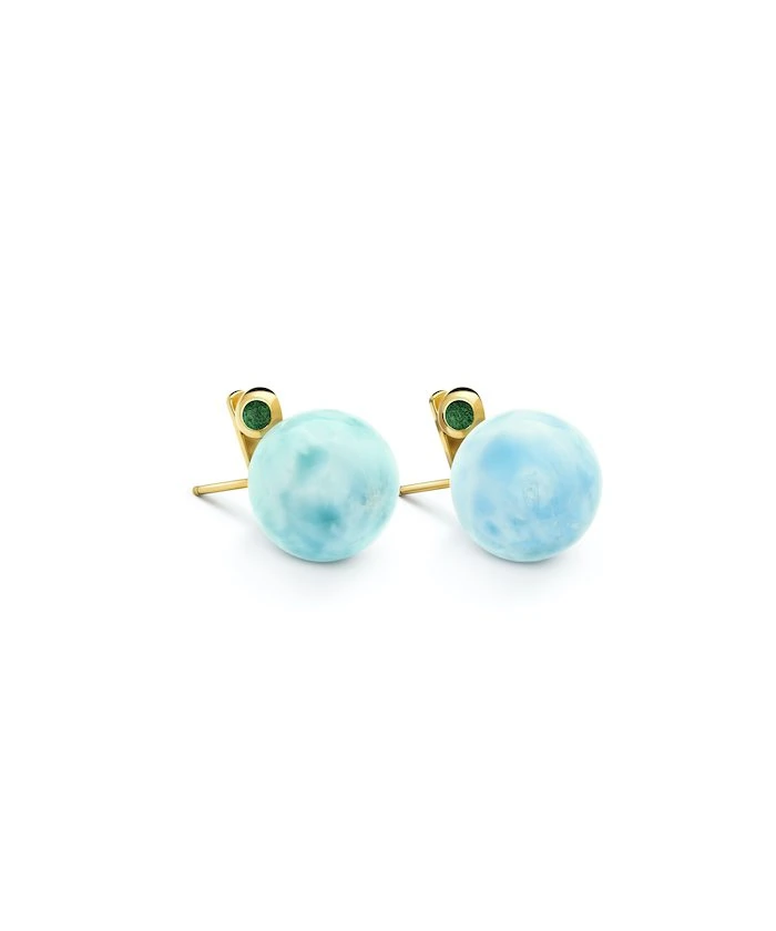 Elegant turquoise jet stud earrings with gold setting, perfect for versatile summer accessories.