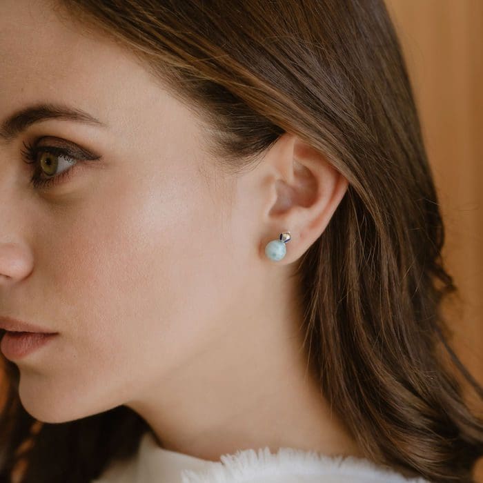 Larimar stud earrings featuring blue gemstone for subtle elegance and everyday sophistication.