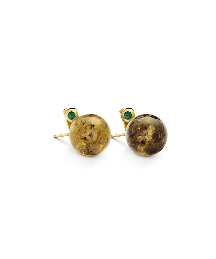 Elegant amber stud earrings with green accents in gold settings.
