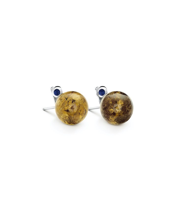 Stylish amber stud earrings with blue accents, perfect for elegant accessories.