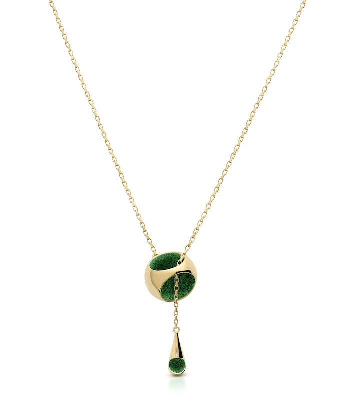 Delicate gold chain necklace featuring a knot design with green accents and a drop pendant. Perfect luxury jewelry piece.