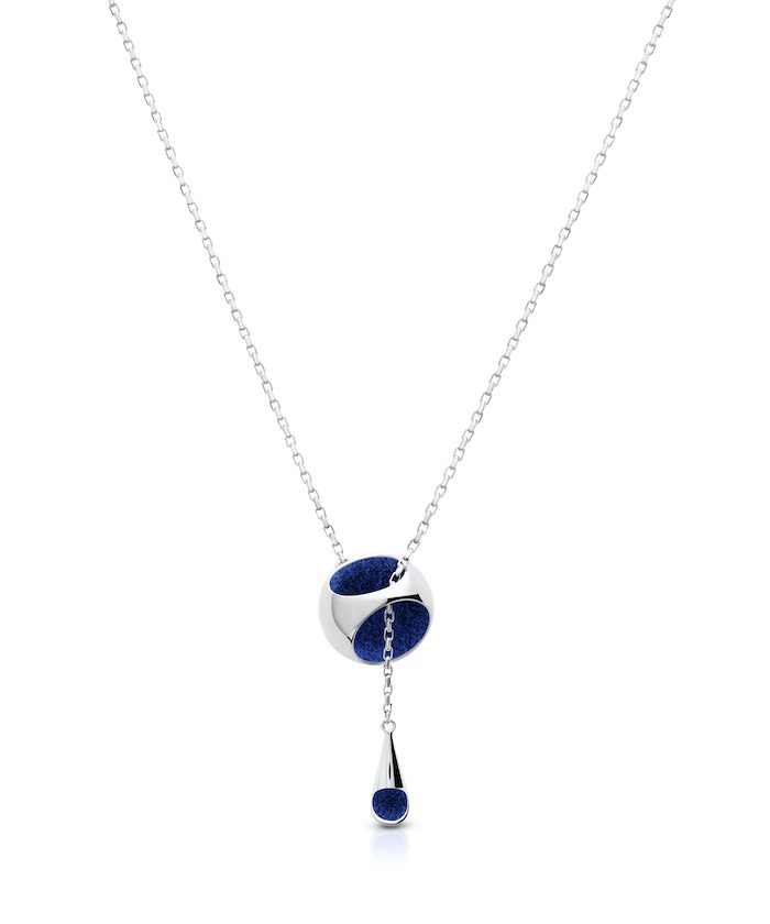 Elegant silver knot pendant with blue accents, perfect for stylish jewelry lovers.