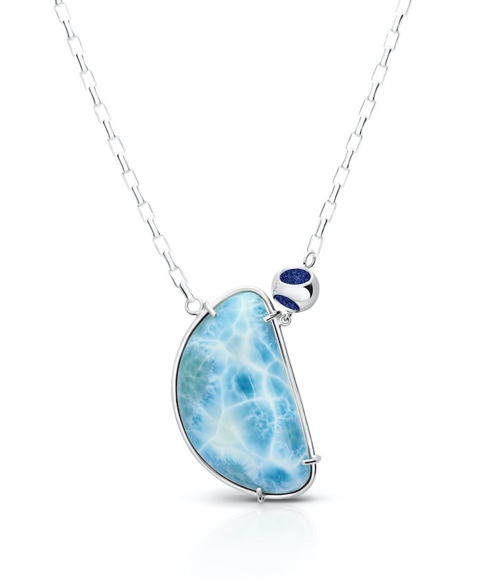 Sterling silver larimar and blue sodalite pendant on a delicate chain. Elegant and vibrant jewelry piece.