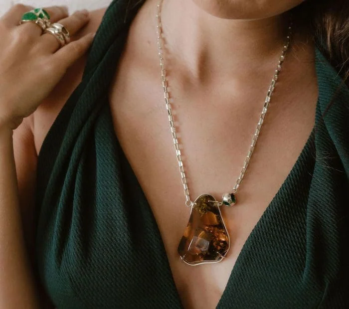 Amber pendant on silver chain, stylish jewelry for women, boho chic accessories.