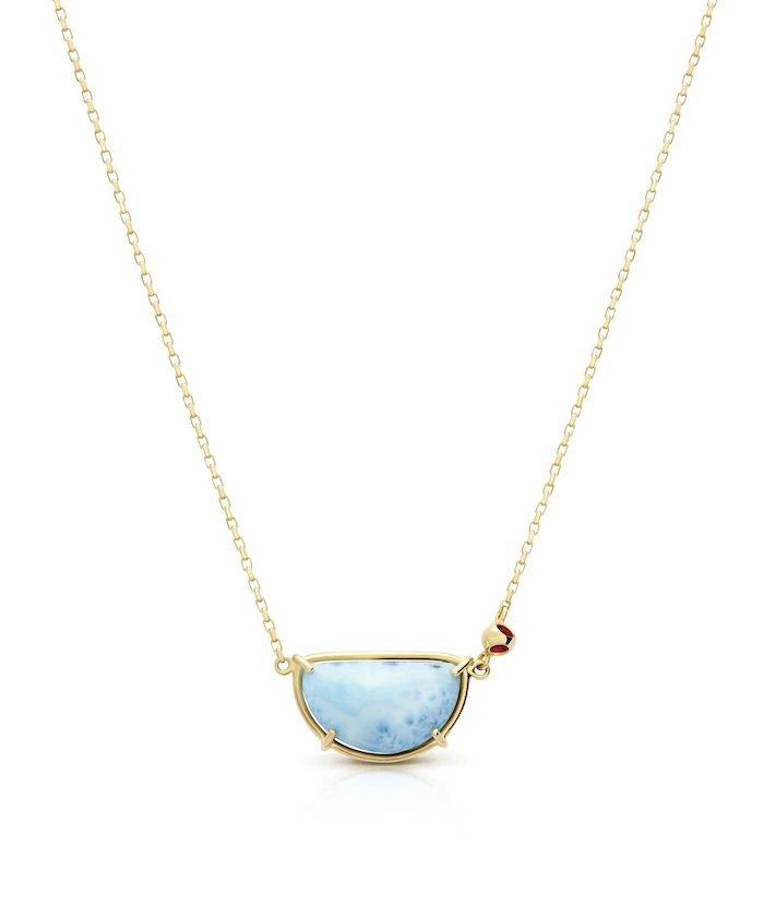 Stunning Larimar pendant in 925 sterling silver with 18k gold micron plating. Perfect for elegant jewelry collection.