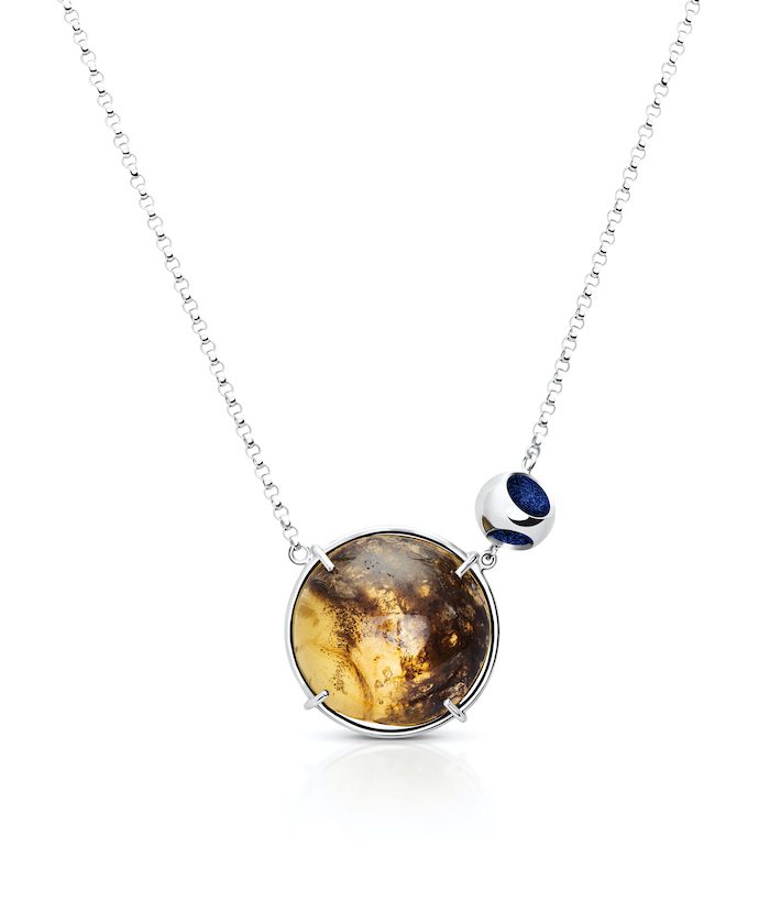 Elegant amber necklace with a round amber gemstone and decorative bead. Perfect for stylish jewelry lovers.