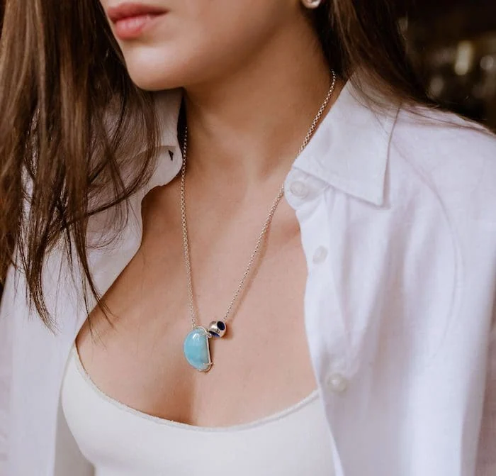 Delicate moonstone pendant necklace with silver chain, perfect for elegant jewelry lovers.