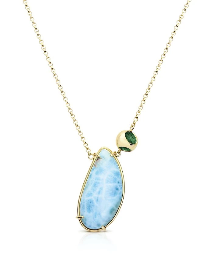 Elegant larimar pendant with 925 sterling silver and 18k gold micron plating.