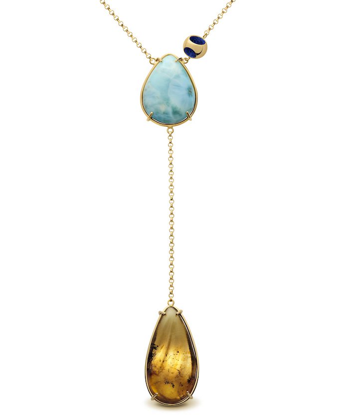 Delicate pendant featuring larimar and amber stones with gold accents, perfect for sophisticated jewelry lovers.