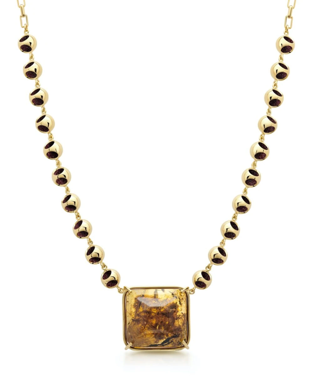 Amber and gold jewelry, pendant choker, stylish accessories, luxury jewelry design.