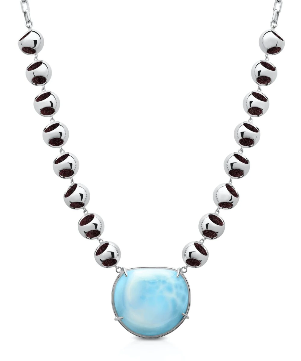 Sterling silver Larimar pendant necklace with black gemstone beads for a stylish look.